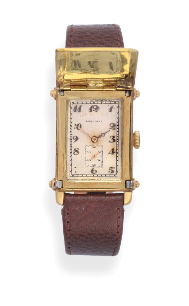 An Unusual Art Deco 18ct Gold Flip Top Rectangular Wristwatch, signed Longines, circa 1927, (calibre