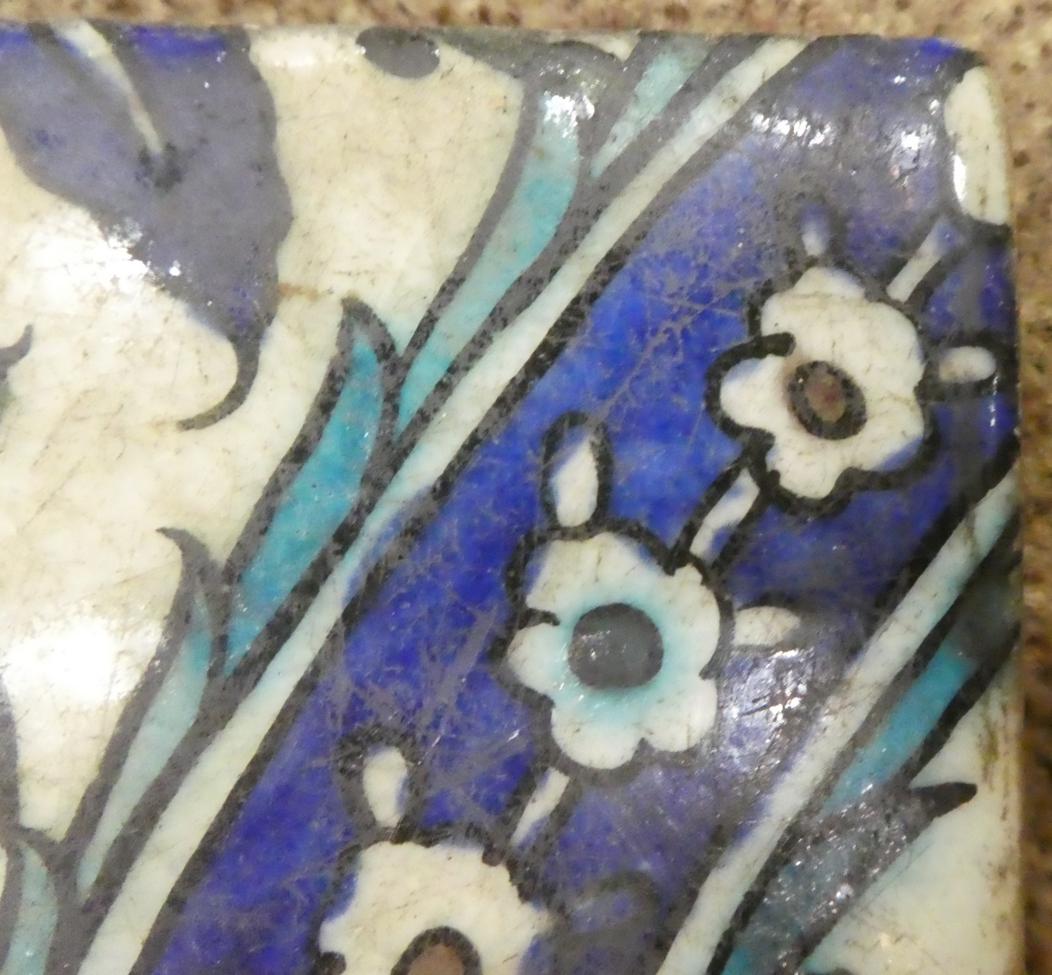 A Damascus Pottery Tile, circa 1580, from the same series, 22cm by 24cm. 6cm by 3.5cm section of - Image 4 of 7