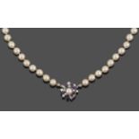 A Cultured Pearl Necklace, eighty-two cultured pearls knotted to a sapphire and diamond cluster