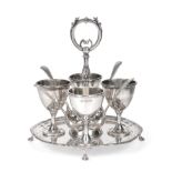 A George V Silver Egg-Cruet, by Harrison Brothers and Howson, London, 1910, on shaped circular stand