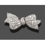 A Diamond Bow Brooch, set throughout with round brilliant cut, eight-cut and baguette cut diamonds