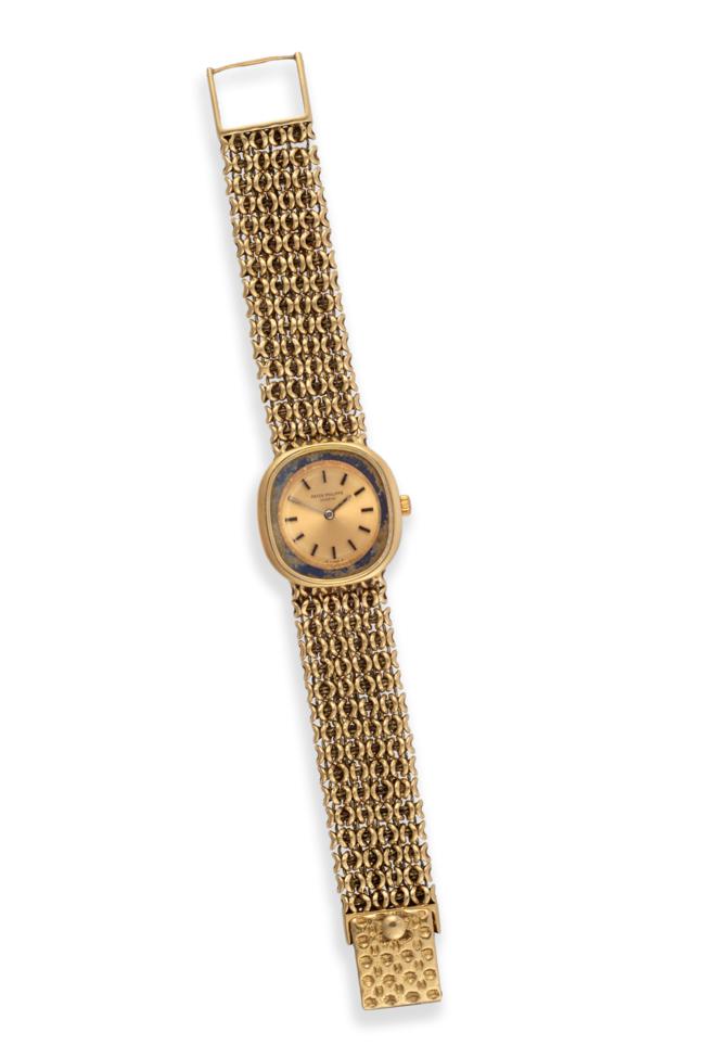 A Lady's 18ct Gold Wristwatch, signed Patek Philippe, model: Golden Ellipse, ref: 4172, circa
