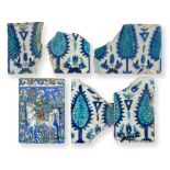 A Group of Five Damascus Pottery Tile Fragments, probably 17th/18th century, painted in turquoise,