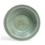 A Chinese Longquan Celadon Glazed Dish, Ming Dynasty, the centre moulded with twin fish, 21cm