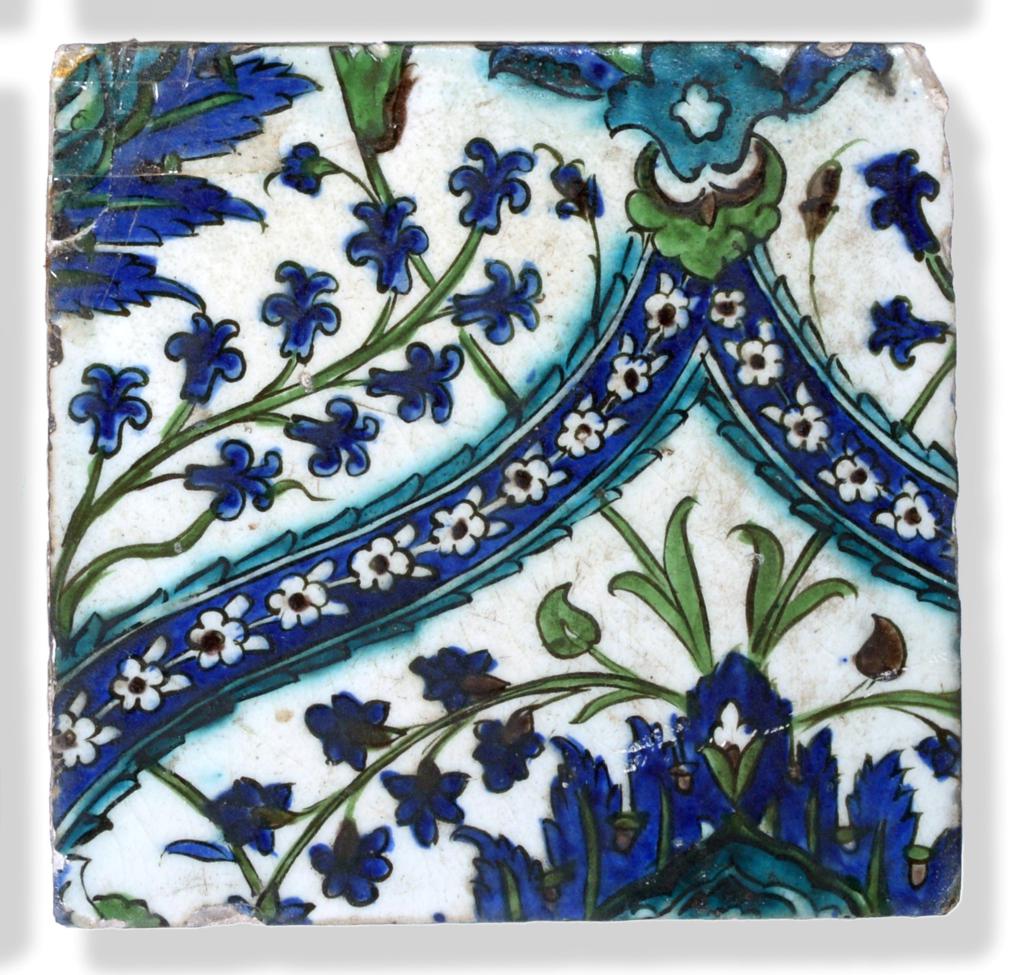 A Damascus Pottery Tile, circa 1580, from the same series, 22cm by 24cm. 6cm by 3.5cm section of