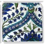 A Damascus Pottery Tile, circa 1580, from the same series, 22cm by 24cm. 6cm by 3.5cm section of