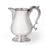 A George IV Silver Beer-Jug, by Robert Garrard, London 1826, plain baluster and on circular domed