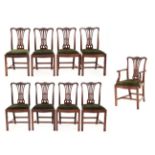 A Set of Nine George III Mahogany Dining Chairs, late 18th century, including one carver, the
