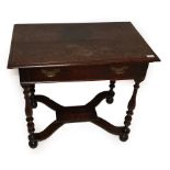 A Late 17th Century Oak Side Table, the rectangular moulded top with a frieze drawer, on turned legs