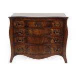 A Chippendale Revival Serpentine Front Mahogany Chest of Drawers, early 20th century, with an