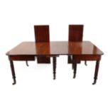 An Early 19th Century Mahogany Telescopic Dining Table, in the manner of Gillows, comprising two D