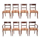 A Set of Eight Late George III Mahogany Dining Chairs, early 19th century, with moulded and curved