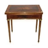 A Louis XVI Style Gilt Metal Mounted Kingwood and Marquetry Tric-Trac Table, the sliding hinged