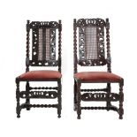 Two William & Mary Walnut Chairs, late 17th century, each with caned seat and back flanked by spiral