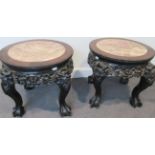 A Matched Pair of Early 20th Century Chinese Hardwood and Pink Marble Plant Stands, each with a