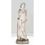 After the Antique: A White Marble Figure of a Maiden, wearing loose robes standing on a