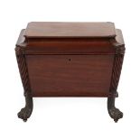 A Regency Mahogany Cellaret, early 19th century, the moulded hinged lid above plain panels divided