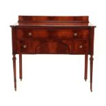 A Regency Style Mahogany and Ebony Strung Sideboard, late 19th/early 20th century, with reeded