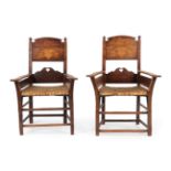 A Pair of 19th Century Oak and Marquetry Marriage Chairs, Low Countries, the curved back supports