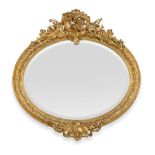 A Rare and Impressive Carved Giltwood and Gesso Overmantel Mirror, circa 1860, of oval form with