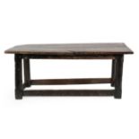 A 17th Century Joined Oak Refectory Table, the top of two plank construction with one cleated end,