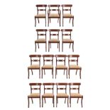 A Set of Fourteen Mahogany Dining Chairs, circa 1820/30, including one carver, recovered in cream