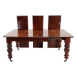 A Victorian Mahogany Telescopic Extending Dining Table, with four original additional leaves, the