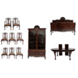 An Eleven Piece Carved Mahogany Dining Room Suite, late 19th/early 20th century, comprising an