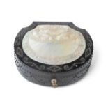 A Palais Royal Ebony Sewing Box, mid 19th century, of scallop form, the hinged cover set with a