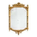 A French Gilt and Gesso mirror, circa 1870, with original mercury plate, with fluted pilaster