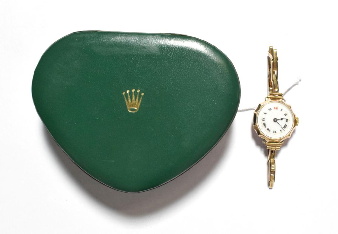 A lady's 9 carat gold wristwatch, inside case back signed Rolex, W & D, London, import marks for