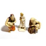 A pair of Royal Worcester water carrier figures and another figure (3)