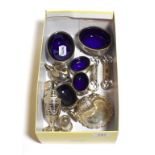 A selection of silver, pair of salts with blue glass liners, pair of knife rests, pair of pin trays,