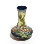 A modern Moorcroft pottery vase in the Sweet Briar pattern designed by Rachel Bishop, with impressed