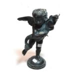 A bronze figure of a putto