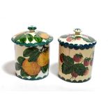 Two Wemyss ware preserve jars, one decorated with strawberries and another