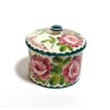 A Wemyss ware biscuit barrel decorated with roses