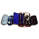 Two cased silver christening sets; a cased silver-handled button hook and shoe horn; a silver box;