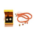 A coral necklace, length 42cm; two pairs of coral earrings and a pair of mabe pearl earrings