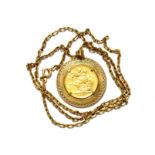 A Victorian full sovereign dated 1875 mounted as a pendant on a yellow metal chain, pendant loop