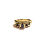 A sapphire and diamond dress ring, stamped '750', finger size N1/2. Gross weight 6.1 grams.