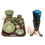 A group of Wedgwood green Jasperware; and an unusual tapering blue glazed Doulton vase, on a brass