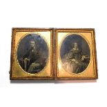 A Victorian double daguerreotype portrait of a lady and gentleman in a fitted leather case,