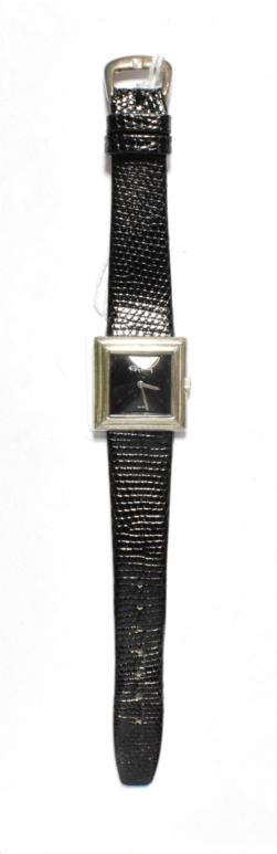 A silver square shaped Roy King wristwatch