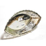 A silver oval shaped pierced bowl