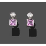 A Pair of 18 Carat White Gold Pink Sapphire and Diamond Earrings, a round brilliant cut diamond