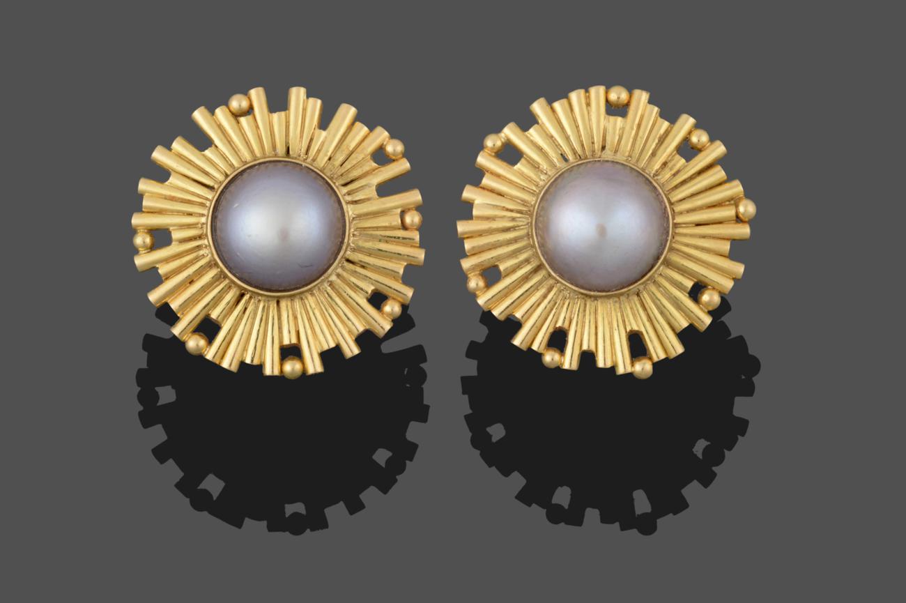 A Pair of 18 Carat Gold Mabe Pearl Earrings, the mabe pearls in yellow rubbed over settings to a