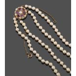 A Two Row Cultured Pearl Necklace, the 107:115 pearls knotted to an amethyst and cultured pearl