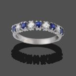 An 18 Carat White Gold Sapphire and Diamond Half Hoop Ring, square step cut sapphires alternate with