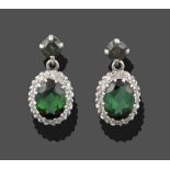 A Pair of Green Tourmaline and Diamond Cluster Drop Earrings, a round cut green tourmaline in a